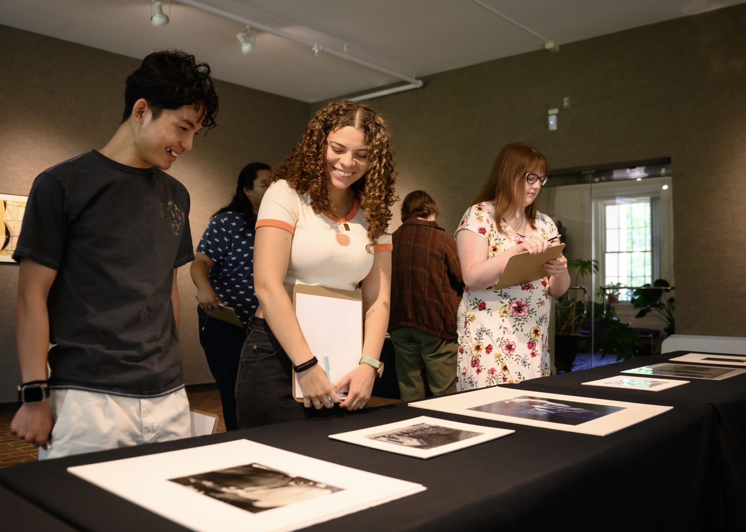Students view pieces in the Doris Ulmann Galleries